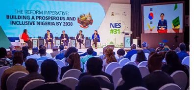 NES #32 delegates at a past summit session